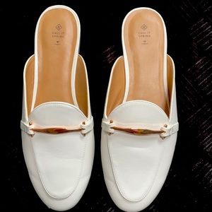 Call It Spring, white slip on gold buckle size 10
